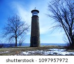 asylum point lighthouse in Oshkosh Wisconsin beautiful icy blue water and sky small historic brick lighthouse 