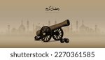 Ramadan Cannon vector design with Silhouette mosques in the background and Arabic calligraphy means: ( Ramadan Kareem) 