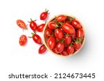 Fresh red cherry tomatoes with half sliced in wooden bowl isolated on white background. Topview. Flat lay.