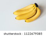bunch of bananas on a white... | Shutterstock . vector #1122679385