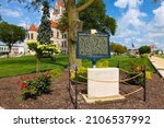 Small photo of Rochester, Indiana, USA - August 22, 2021: Plaque tells the history of Rochester College at The Fulton County Courthouse