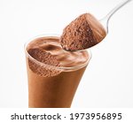 Chocolate mousse spoon and Chocolate mousse glass on a white background