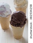 Small photo of different de;licious homemade ice creams in cone