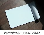 Small photo of Blank Book on Wooden Table. (workplace, mock up, Copy Space, Paper Mock up, Blank Book Muck up, Book Muck up, white Mockup, Sheet mockup )