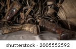 Small photo of Auschwitz Birkenau, Poland, 05.07.2021. Old, stolen wooden prosthetic legs in concentration camp.