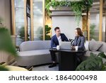 Small photo of Caucasian business people is working on new strategic planning for next year using laptop while working in green eco friendly modern working space surrounded by air purifying house plant