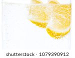 two slices of fresh juicy lemon ... | Shutterstock . vector #1079390912