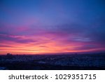 Panoramic view from the window. Dawn in the city