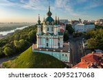 Small photo of Aerial view of St. Andrew's Church and St. Andrew's Street, is one of the most important sights of the city of Kiev. City landscape of the Podolsk region. Tourism, recreation, vacation.