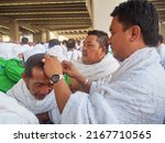 Small photo of Head shaving during haj and umrah is called tahallul, refers to dissolution or ending the state of Ihraam, Mecca Saudi Arabia, October 4th 2014