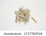 Dried salted anchovies isolated on white background. Traditional snack, appetizer for beer