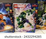 Small photo of Honolulu - August 2, 2023: The Hulk Mech Armor Lego set stands ready for action on the store shelf, inviting young Avengers fans to build their own superhero adventure.