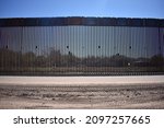 Border wall construction on the USA Mexico border in the Sonoran Desert in Arizona