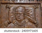 Small photo of Freistadt, Upper Austria, Austria - 09 06 2023: Detail of an epitaph in the Church of Our Lady, the depiction of dignitaries on their deathbed was of far-reaching importance in the Middle Ages