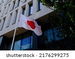 Small photo of The Japanese national flag - hinomaru, is flown at half-mast in front of Embassy of Japan as a mark of respect for the memory of Shinzo Abe, former PM of Japan in Brussels, Belgium on July 8, 2022.