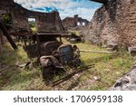Small photo of Oradour-sur-Glane, France - Aug 2014: Ruins of village that was obliterated during World War 2 by the SS