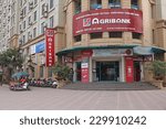 Small photo of HANOI, VIETNAM - NOV 12, 2014: Front view of a branch of Agribank in Hanoi capital. Agribank is one the biggest state owned commercial bank in Vietnam.