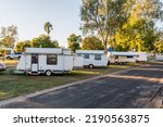 Small photo of RV caravans camping at the caravan park. Camping vacation travel