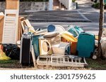 Small photo of Household miscellaneous rubbish garbage items put on the street in Australia for council waste collection
