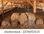 Hay Bales Stacked In Old Wooden ...