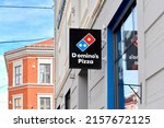 Small photo of Oslo, Norway -05-14-2022: Domino's Pizza sign on the wall in Thorvald Meyers street. Domino's Pizza is currently offering delivery and takeout