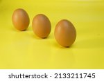 close up photo of chicken eggs | Shutterstock . vector #2133211745