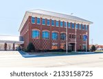 Small photo of GASTONIA, NC, USA-3 MARCH 2022: Truist Bank building,side view showing building, sign, drive thru.