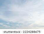 Beautiful blue sky bright midday sun with fluffy clouds. Summer sunshine with white cloudscape background. Natural scenic sunny day horizon sky wallpaper backdrop.