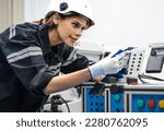 Electronic and robotic engineer working on robot automation technology. Modern women learning futuristic innovations to smart AI machine mechanical development in the laboratory. Industry 4.0 project.