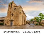 Small photo of Pals, Spain - June 1 2022: The Sant Pere Church in the medieval stone village of Pals, on the Northern Costa Brava coast of Spain