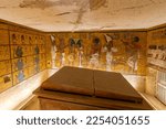 Small photo of Luxor, Egypt - November 27 2022: Interior view of the inner chamber and ancient sarcophagus tomb of Pharoah King Tutankhamun, tomb KV62 in the Valley of the Kings, Luxor Egypt