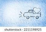 Small photo of Valentines vintage truck with heart hand drawing (painted) on snow under windshield wiper of car in the winter day. Pickup delivers heart. Valentine’s Day, winter, concept. Copy space.