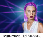 Portrait of a beautiful young woman in futuristic style against the background of ultraviolet lines. The concept of digital identification, total control, digital security, personal data protection.
