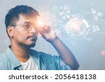 business man wearing AI glasses showing business technology innovation network hologram
