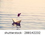 Paper Boat On The Water