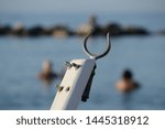Small photo of closeup of an oarlock on the beach of Adriatic coastline