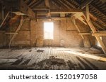 Old Rustic Attic with Sunlight coming through Window.