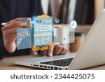 Small photo of Tax concept. Person using computer to fill out personal income tax return to pay taxes online. State tax. Financial research. data analysis, documents, reports, tax returns, calculations.