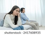 Small photo of Divorce. Asian couples are desperate and disappointed after marriage. Husband and wife are sad, upset and frustrated after quarrels. distrust, love problems, betrayals. family problem, teenage love