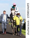 Small photo of DONCASTER RACECOURSE, STH YORKSHIRE, UK : 14 SEPTEMBER 2019 : Frankie Dettori and Logician leave the Parade Ring prior to winning the 2019 running of the St Leger at Doncaster Races