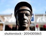 Small photo of YORK RACECOURSE, NORTH YORKSHIRE, UK : 24 September 2021 : The Lester Piggott statue outside the old Weighing Room at York Races