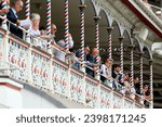 Small photo of YORK RACECOURSE, NTH YORKSHIRE, UK : 17 June 2023 : Racegoers look from the Gimcrack balcony during the MacMillan Race Meeting at York Races