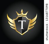 modern t shield crown wing logo ... | Shutterstock .eps vector #1316877098