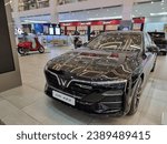 Small photo of Ho Chi Minh City, Vietnam - November 15 2023: The front view of Vinfast Lux A2.0 car in Vincom in Ho Chi Minh City, Vinhomes, Vingroup, Retail downturn, Economic downturn