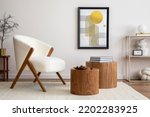 Interior design of harmonized living room with mock up poster frame, white boucle armchair, wooden coffee tables, decoration and personal accessories. Cozy home decor. Template. 
