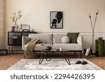 Small photo of Creative composition of living room interior with mock up poster frame, gray sofa, black coffee table, patterned rug, plants in flowerpots, slippers and personal accessories. Home decor. Template.