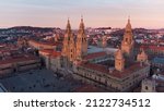Aerial view of the Obradoiro facade of the cathedral of Santiago de Compostela at sunset
