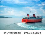 Red Ferry Boat Sailing On The...