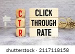 Small photo of CTR click through rate symbol. Wooden blocks with words 'CTR click through rate'. Beautiful white background. Business and CTR click through rate concept. Copy space.