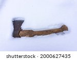An Old Axe With A Wooden Handle ...